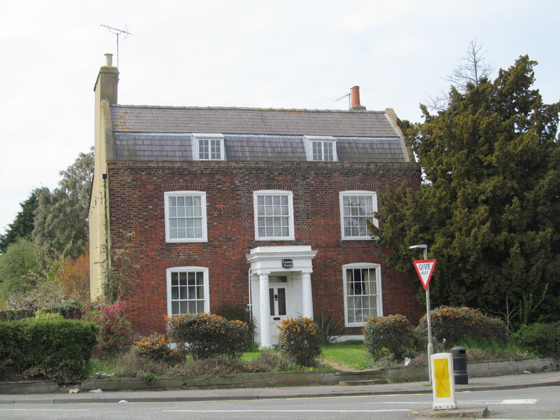 Brick House with White Trim