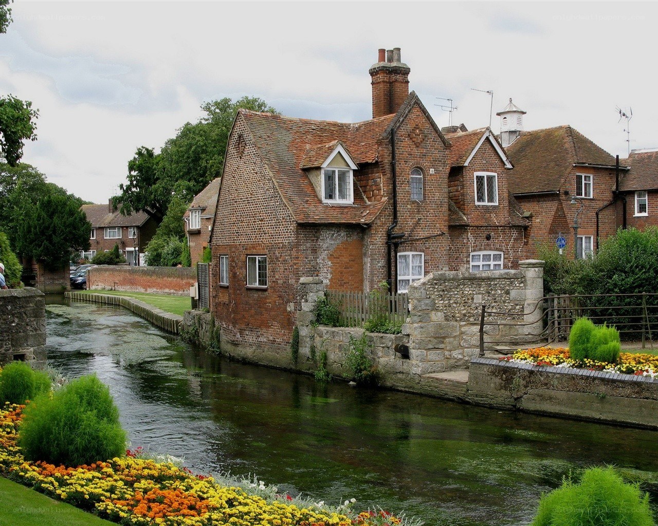 Brick houses along a river