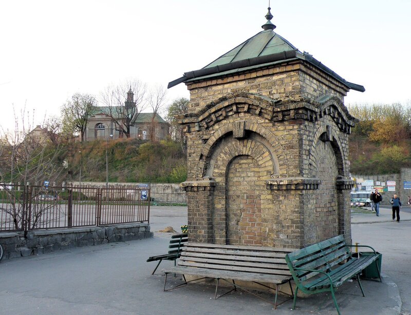 Brick kiosk with benches