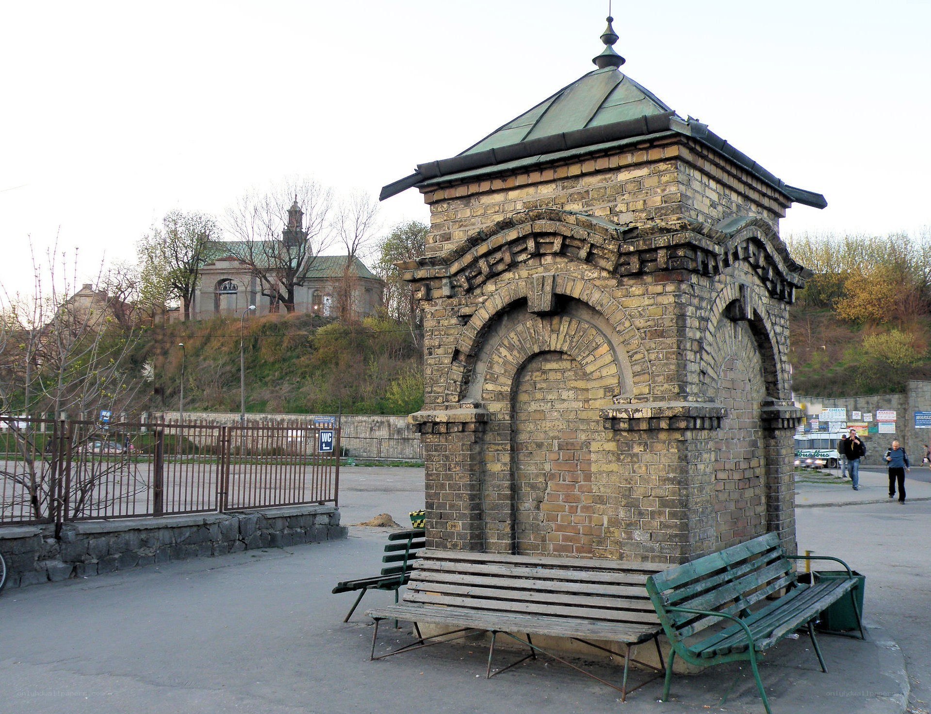 Brick kiosk with benches
