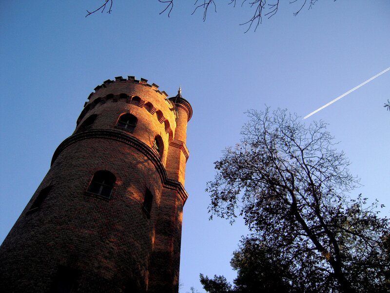 Brick tower under blue sky
