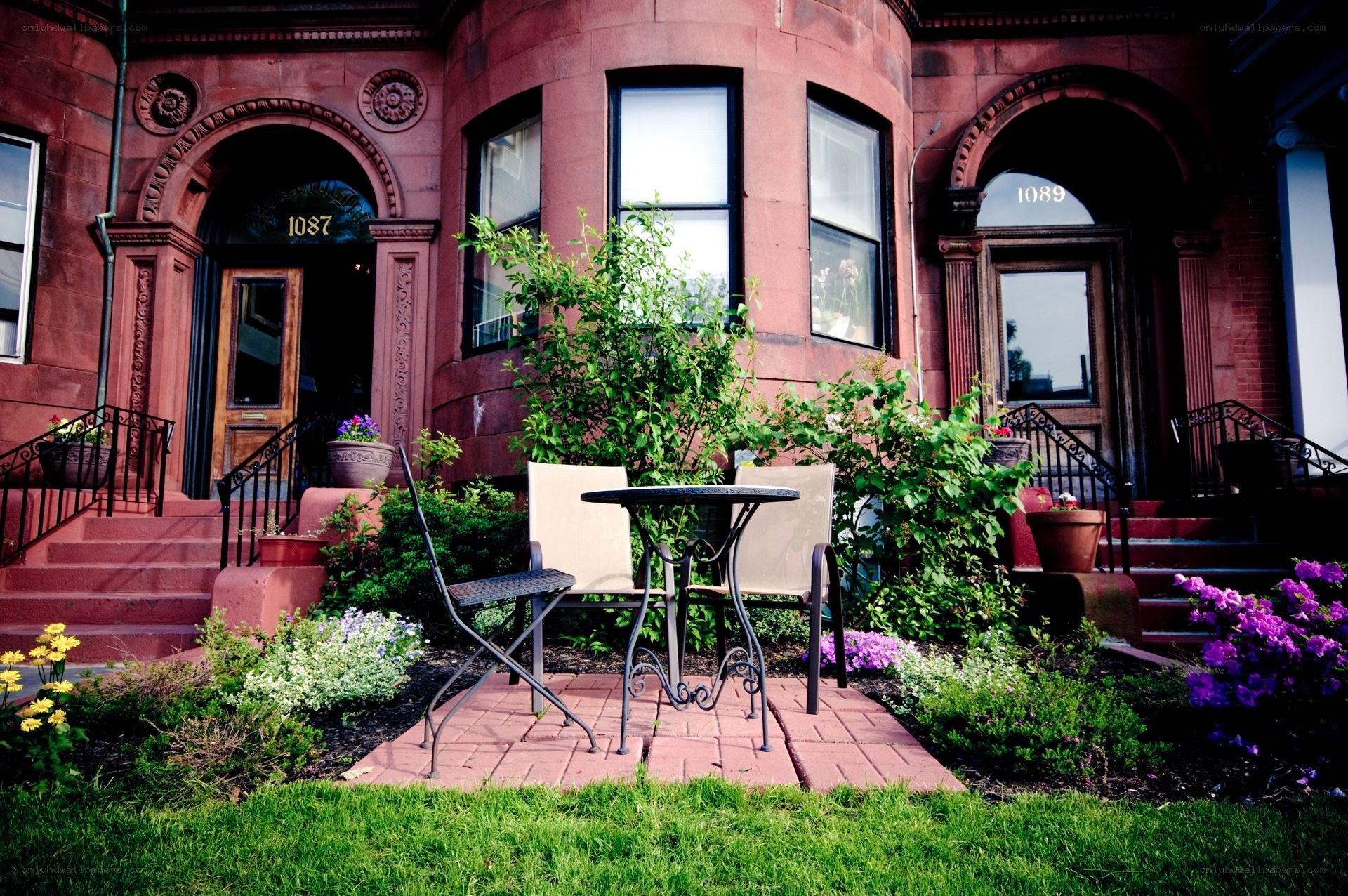Brick townhouses with garden seating