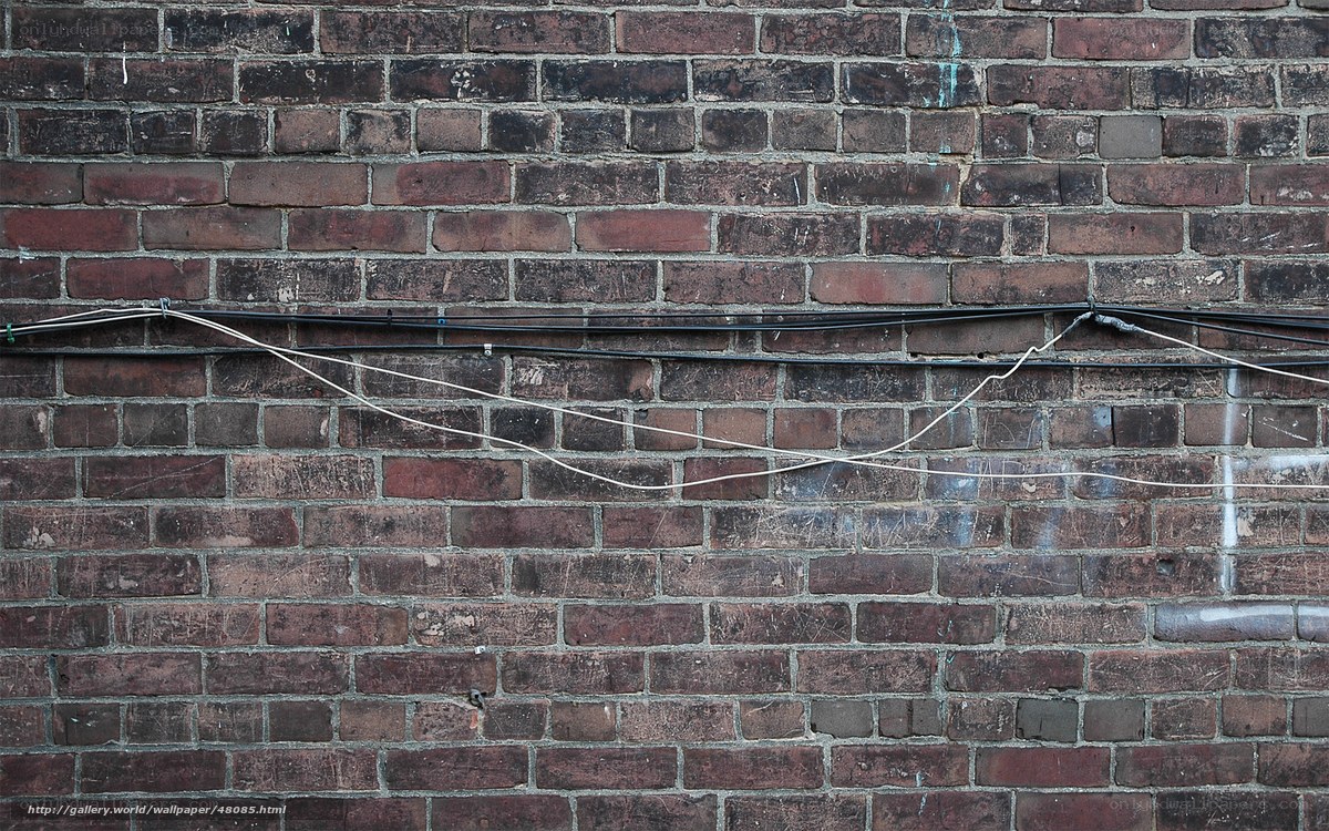 Brick wall with cables