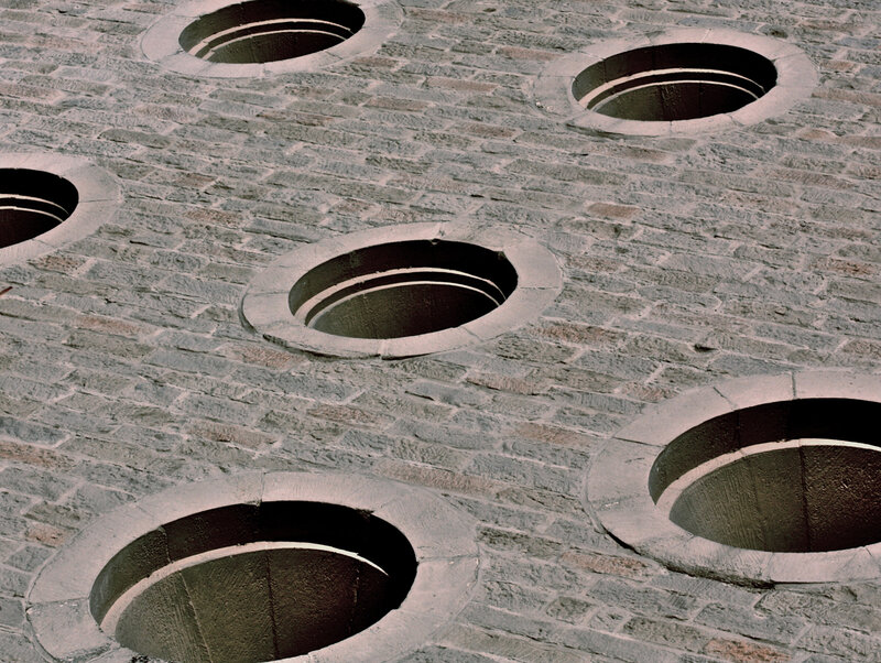 Brick wall with circular openings