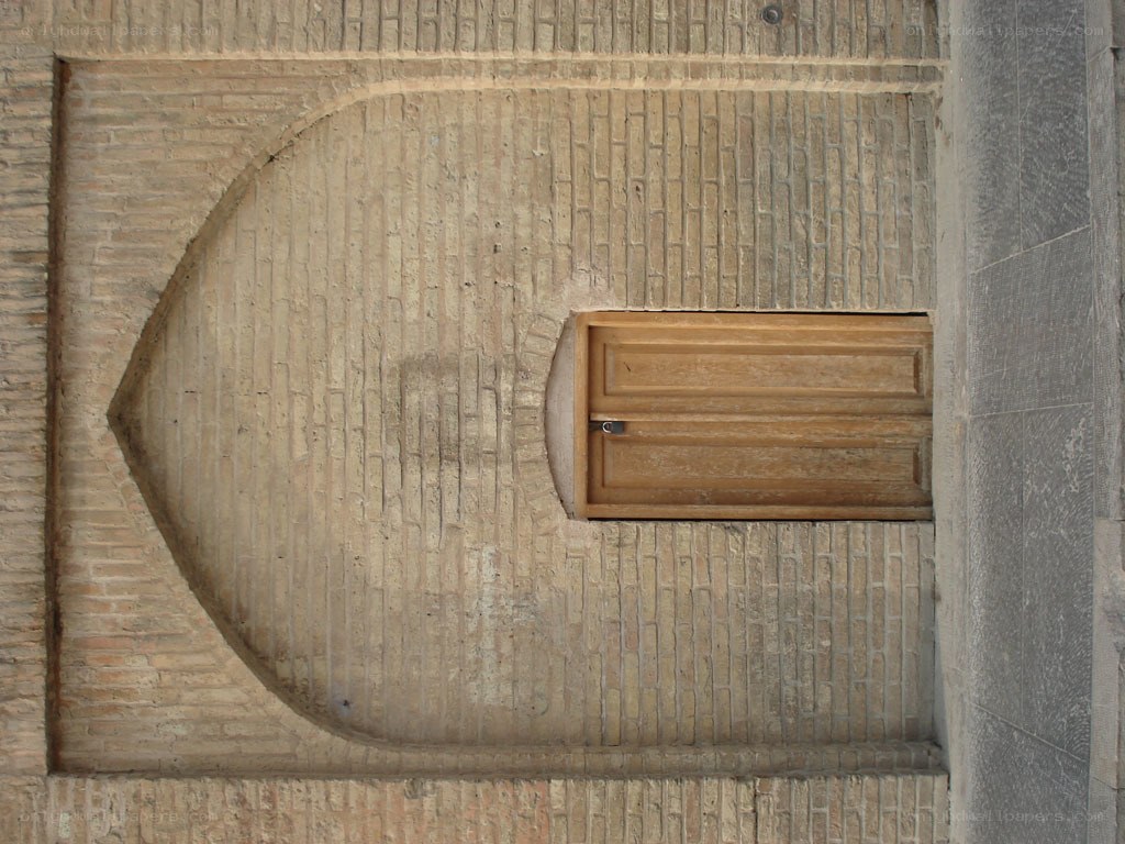 Brick wall with wooden door