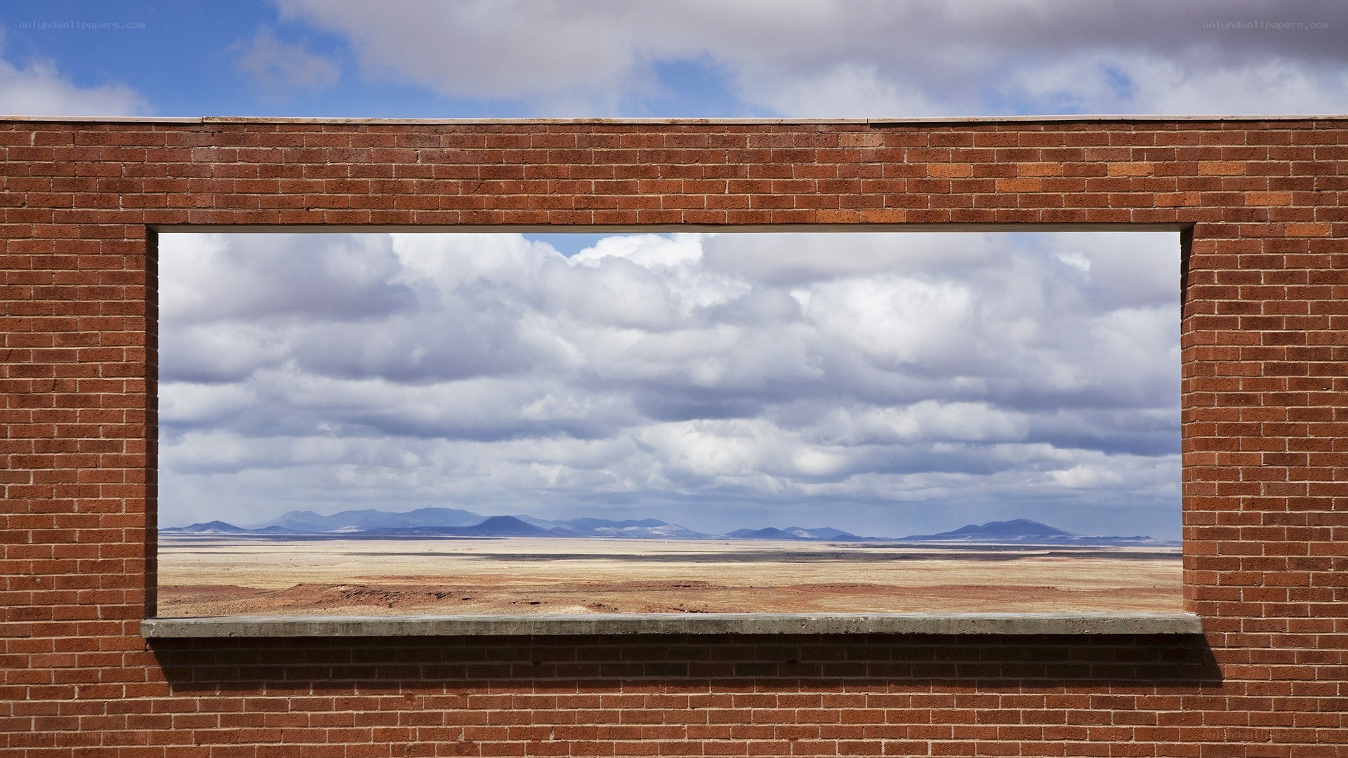 Brick window view of desert