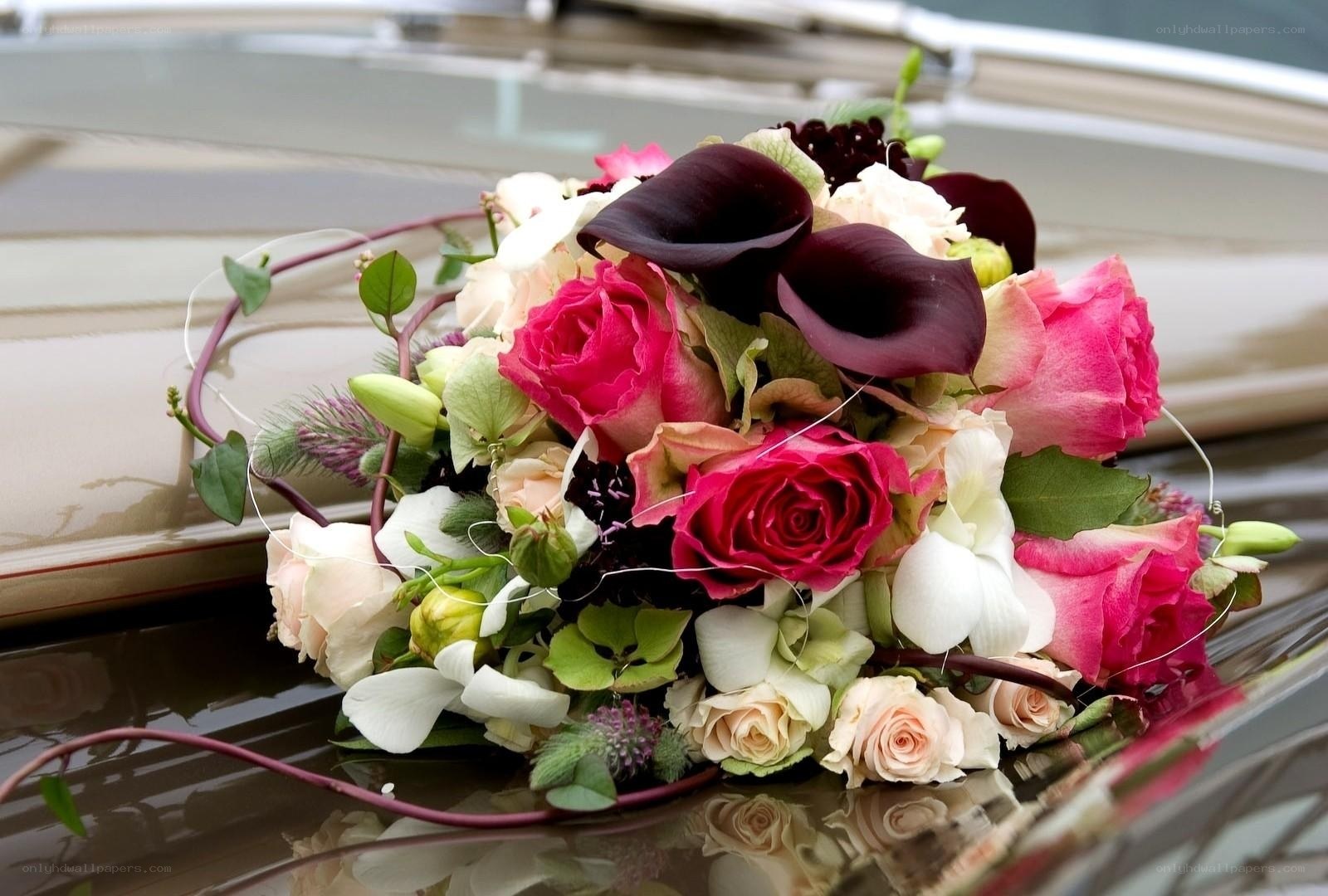 Bridal bouquet on car hood