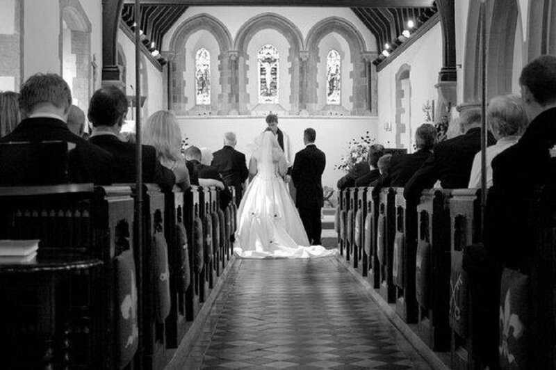 Bride and Groom at Altar — Black