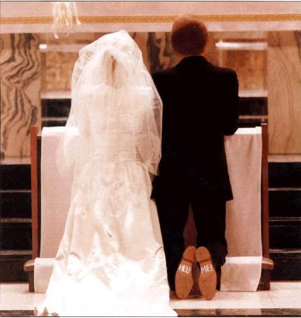bride and groom at altar