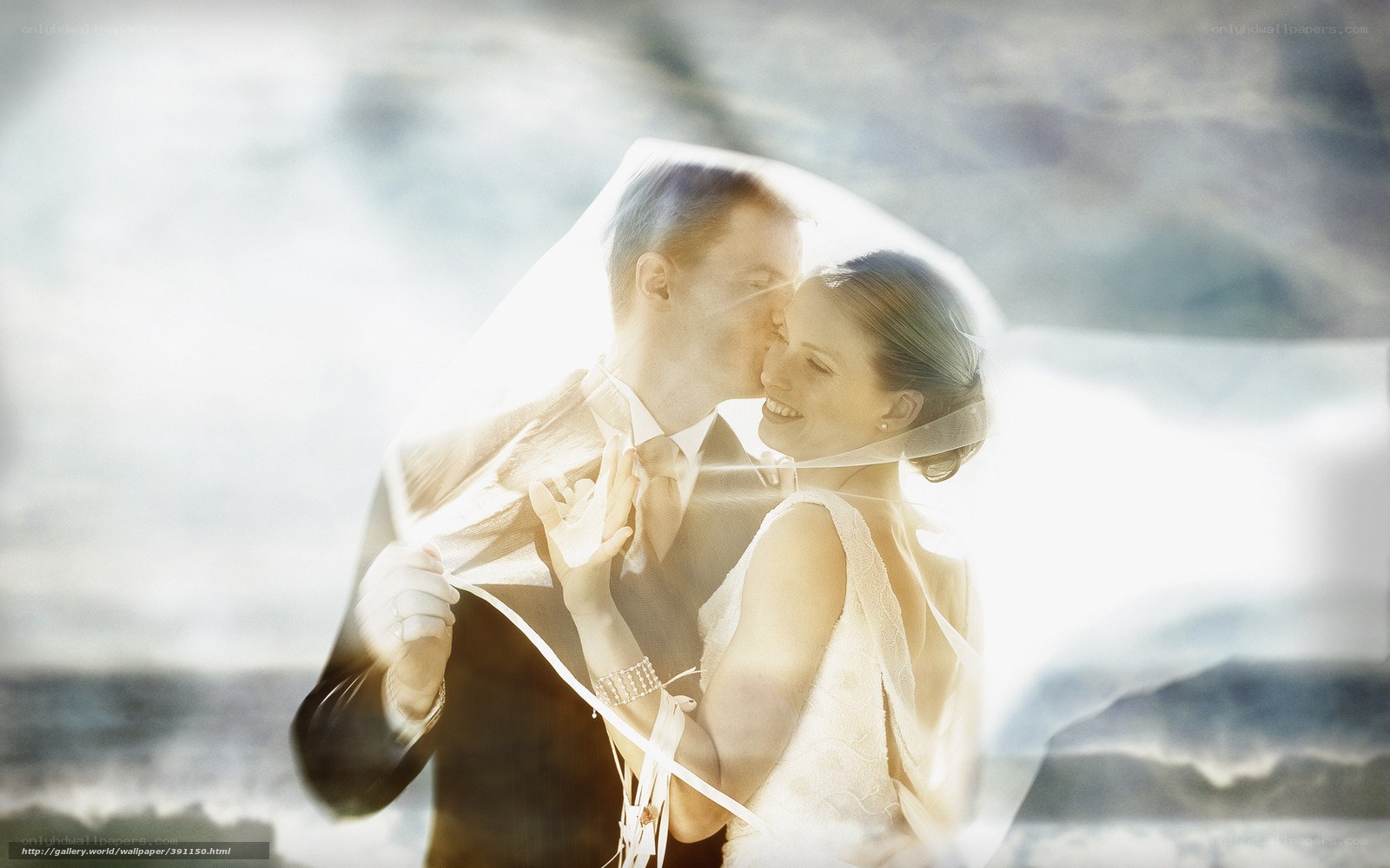 Bride and groom at beach