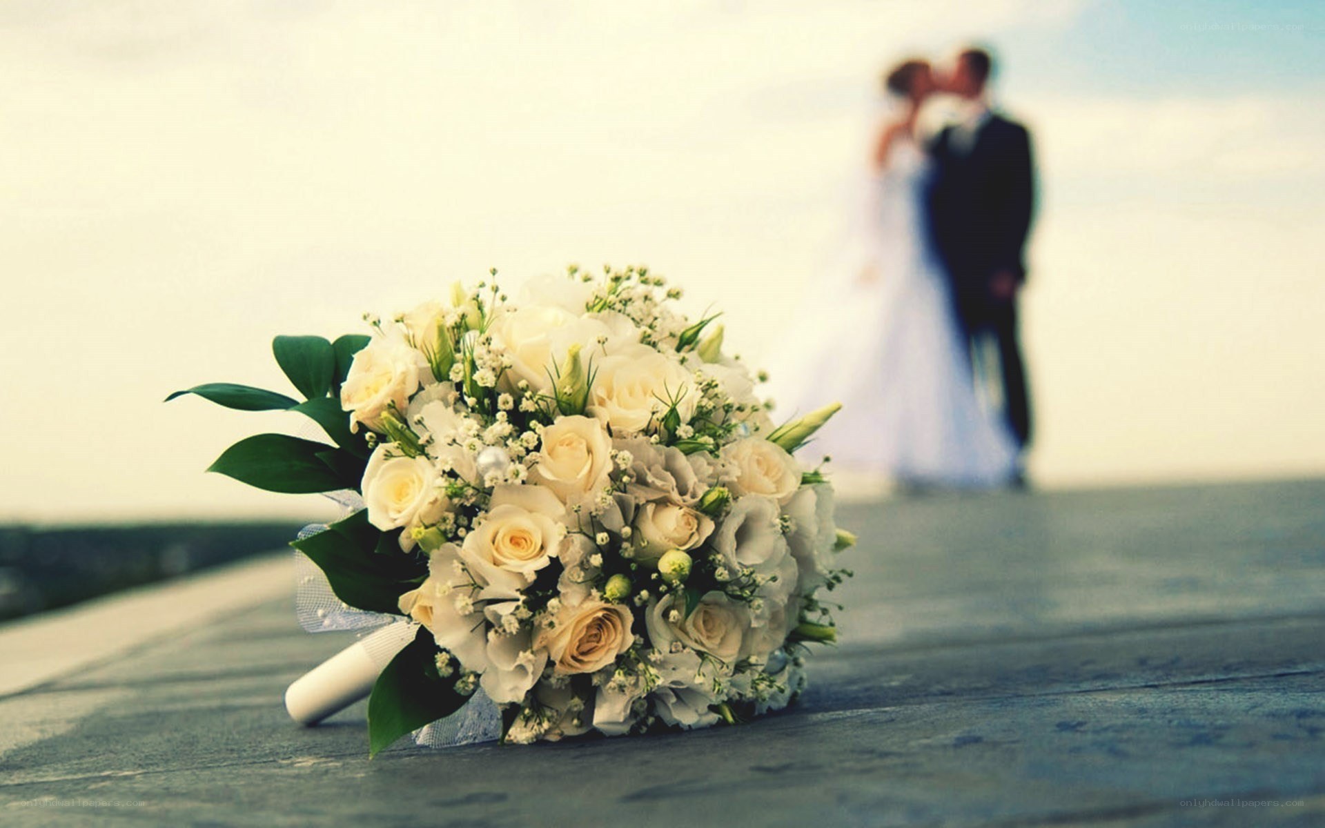 Bride and groom at sunset
