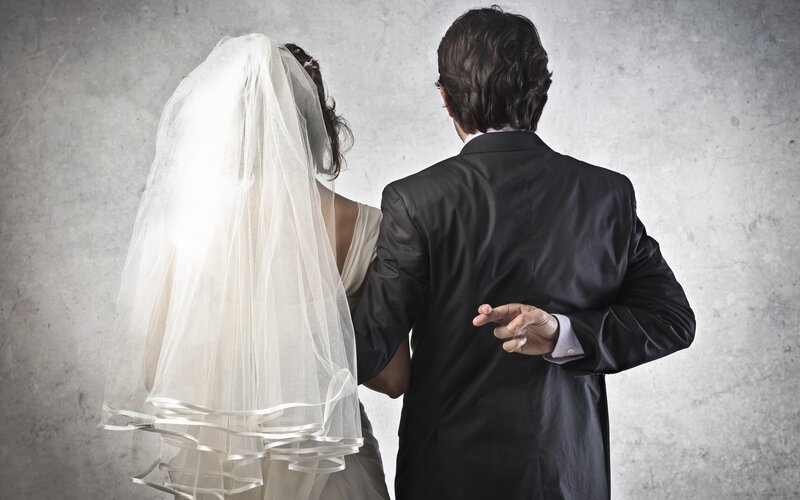 Bride and Groom Couple — White, Dramatic, Photograph, Veil, Suit, Back View