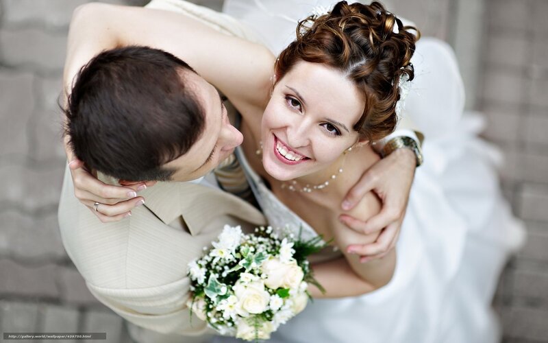 Bride and groom embracing