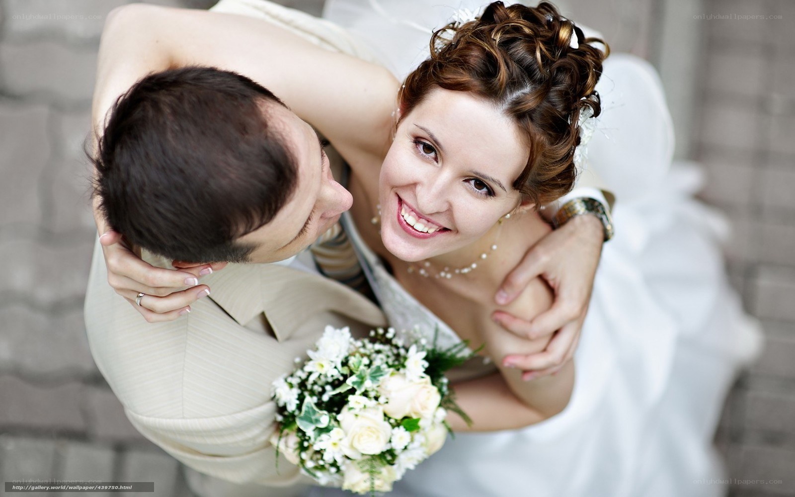 Bride and groom embracing