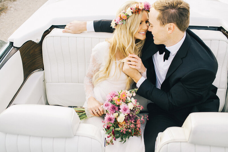 Bride and Groom in Car — White