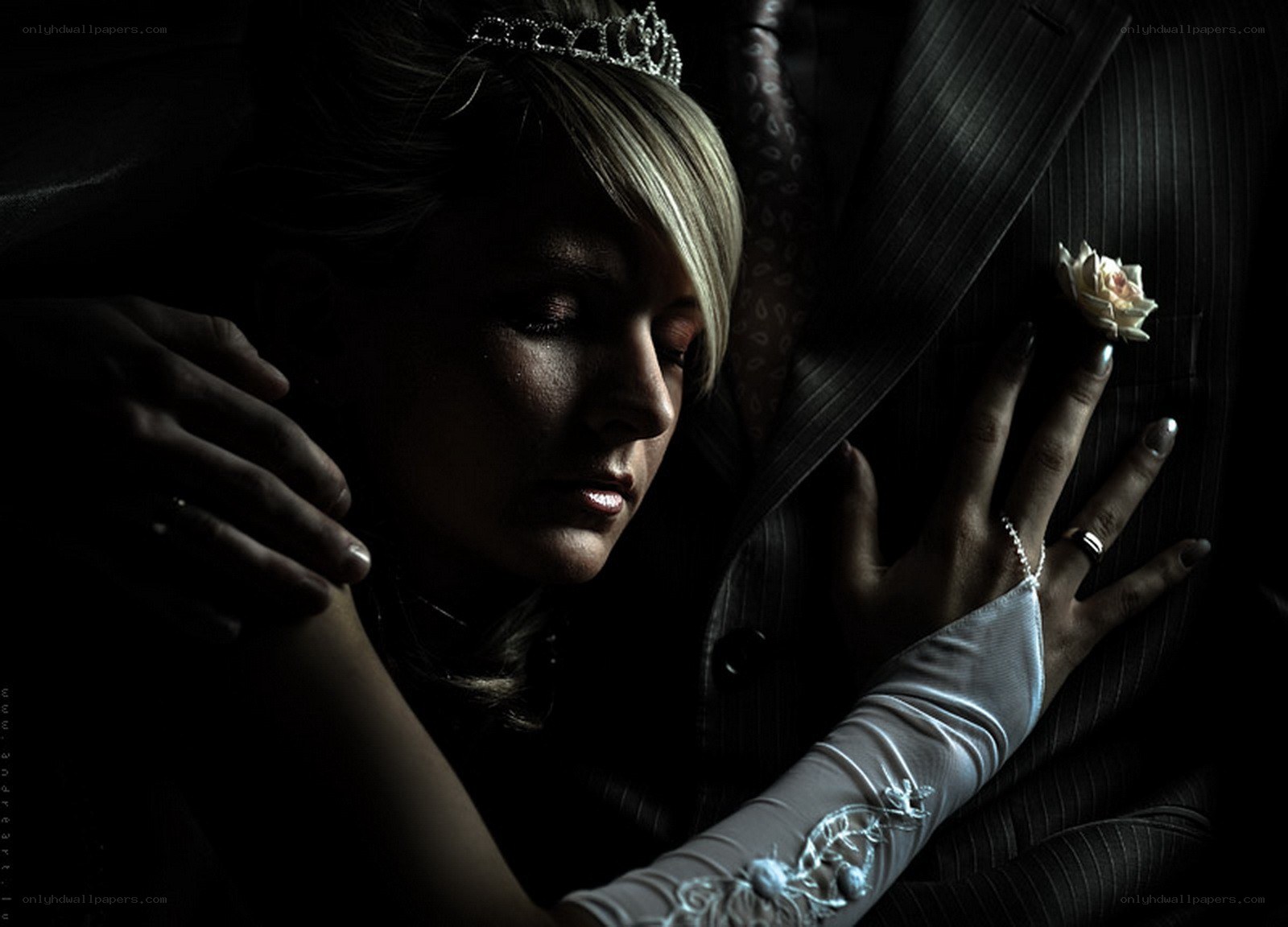 Bride and groom in dark light