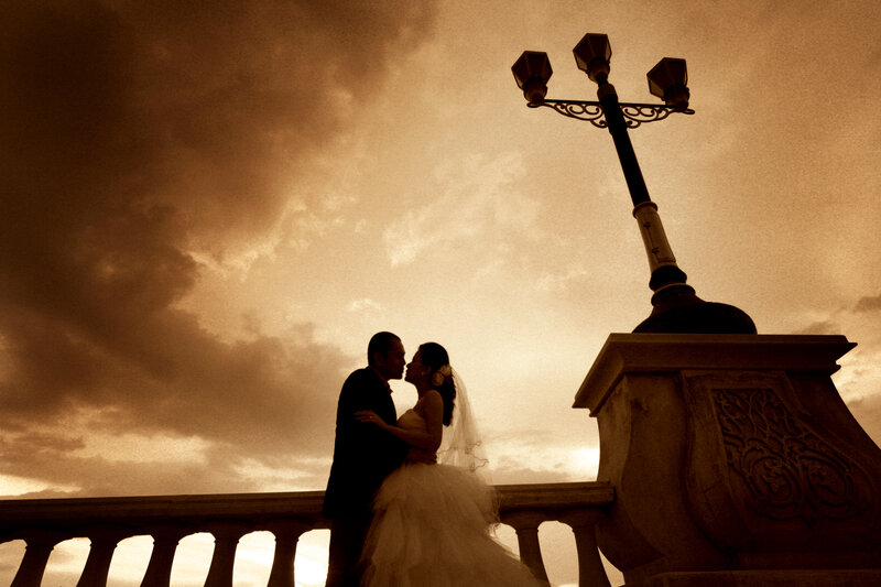 Bride and Groom Kissing — Brown