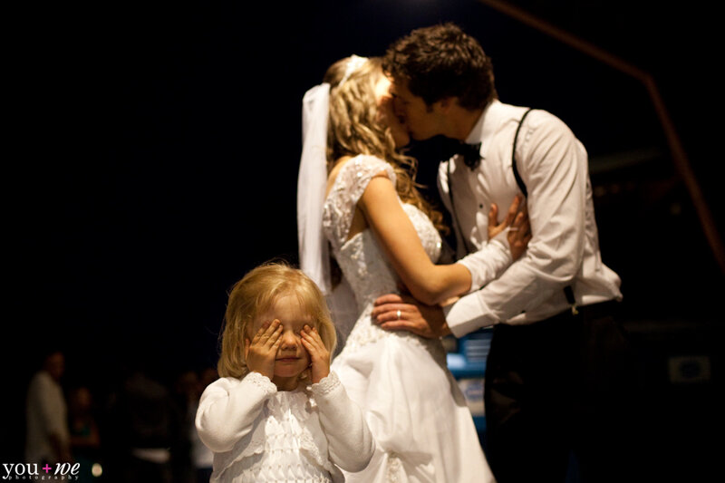 Bride and Groom Kissing — White