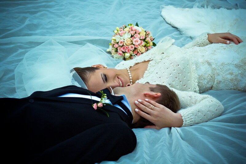 Bride and Groom Lying
