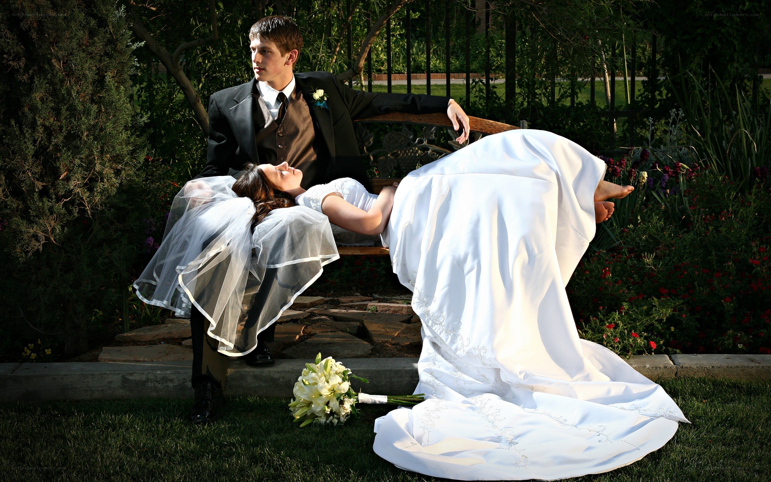 Bride and groom on a bench
