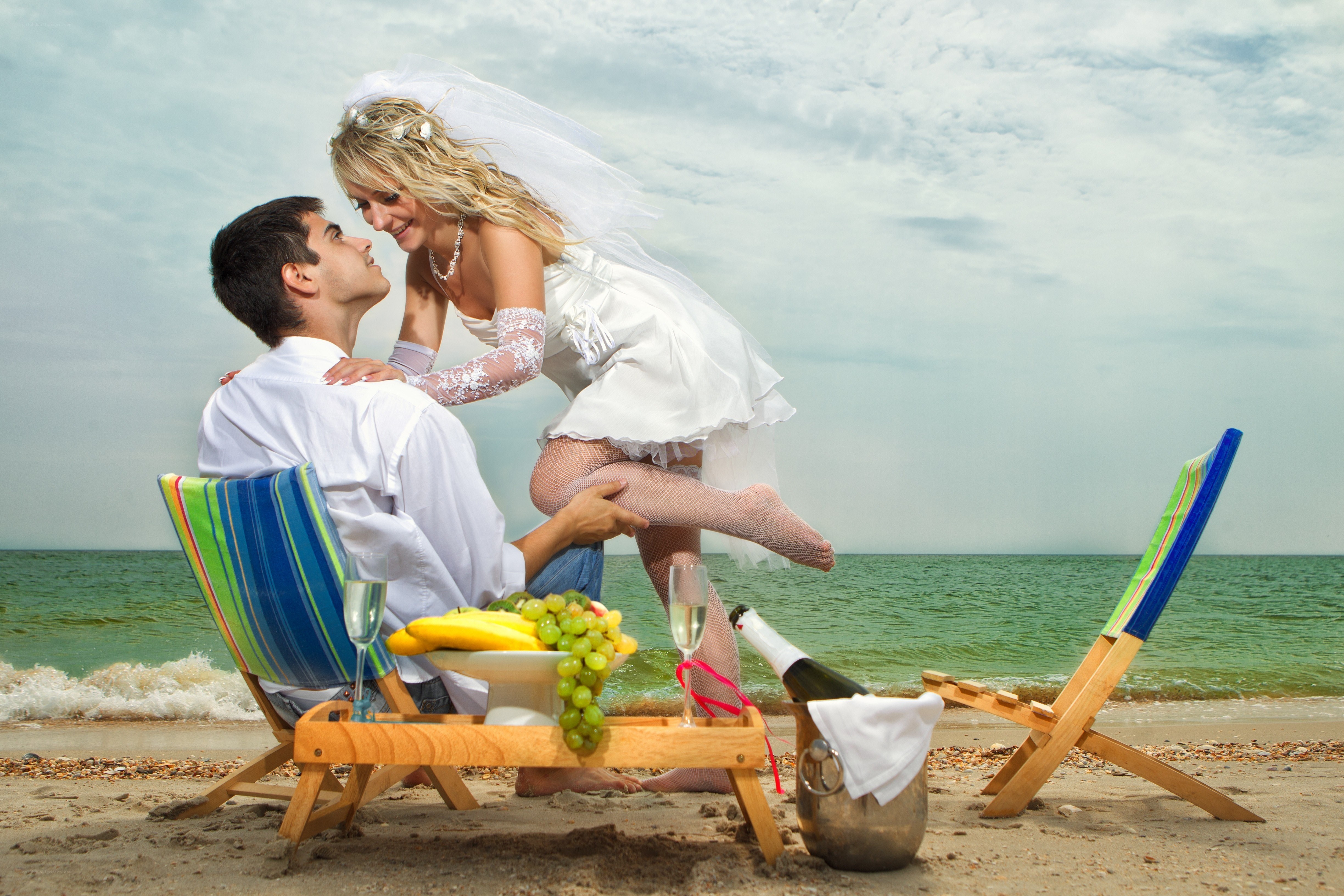 Bride and groom on beach