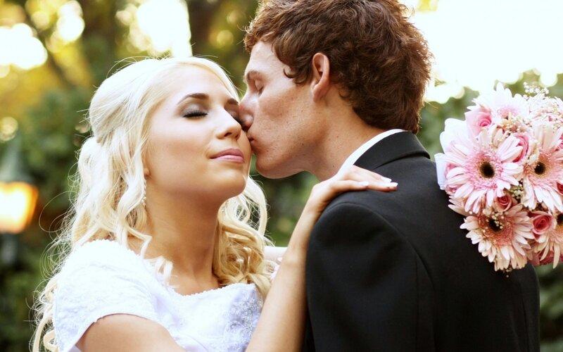 Bride and groom sharing a kiss