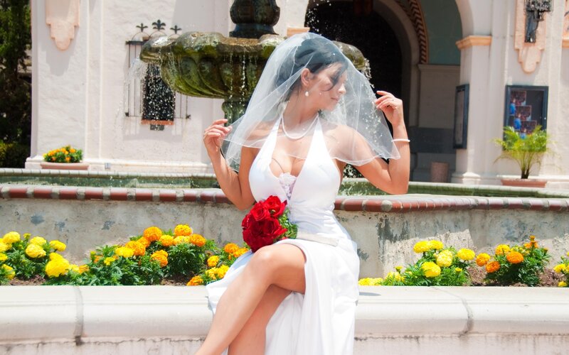Bride at fountain with flowers