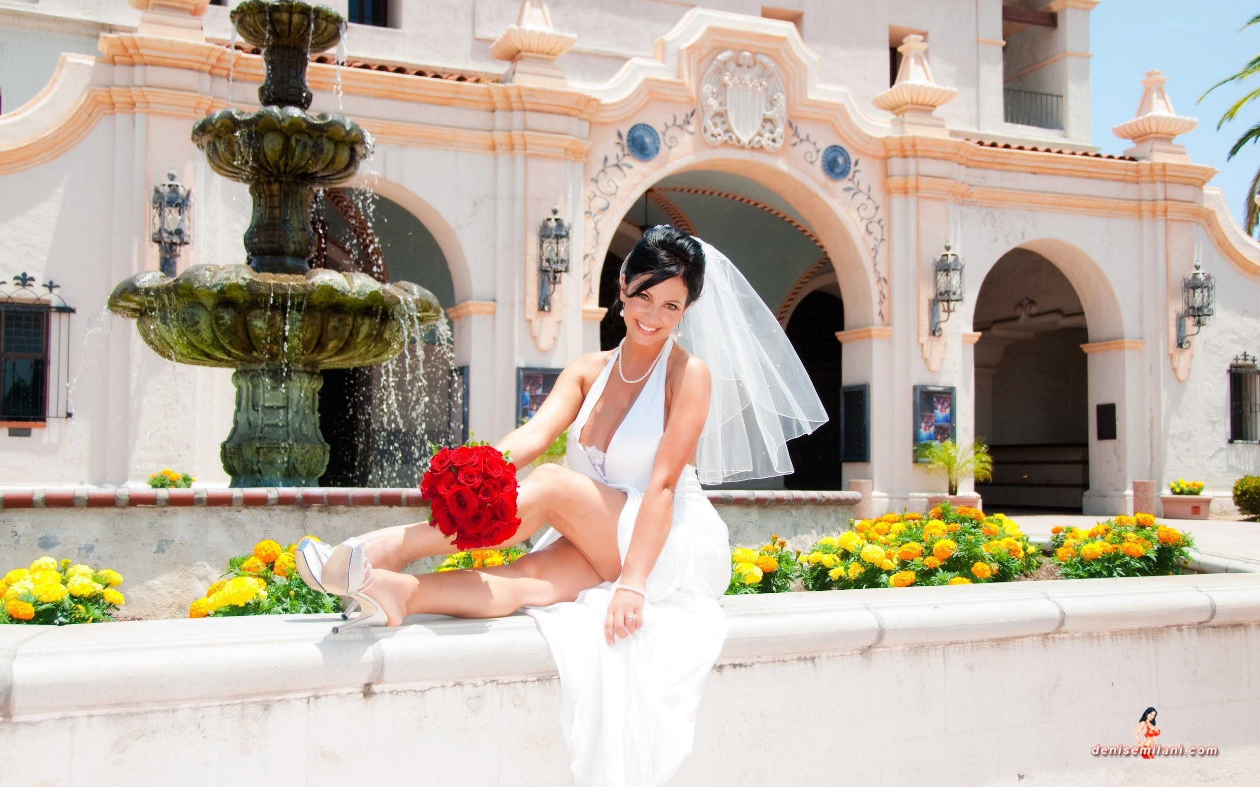 Bride by fountain
