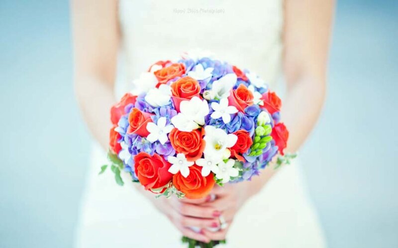 Bride Holding Bouquet — Red, Serene