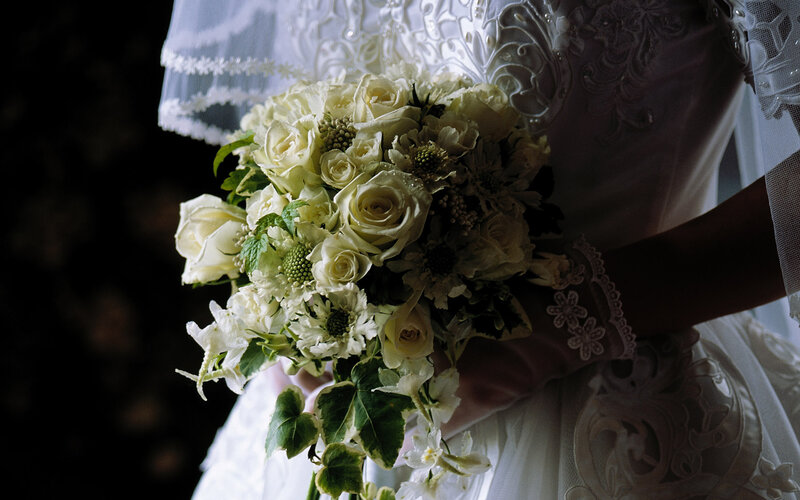 Bride Holding Bouquet — White, Dramatic