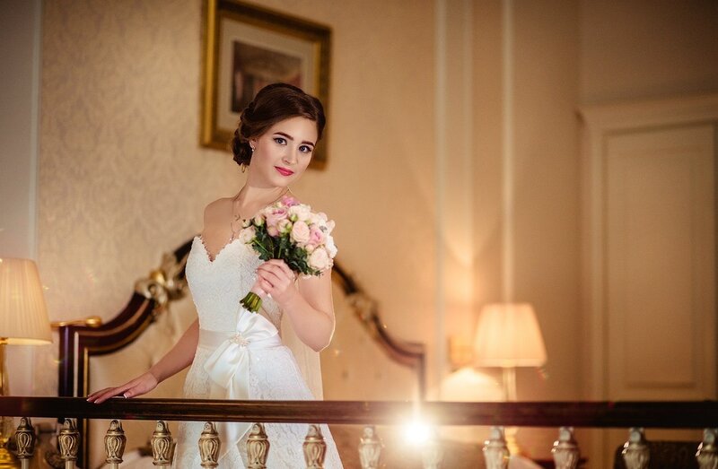 Bride Holding Bouquet — White, Elegant, Night