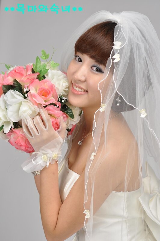 Bride Holding Bouquet — White, Happy, Photograph