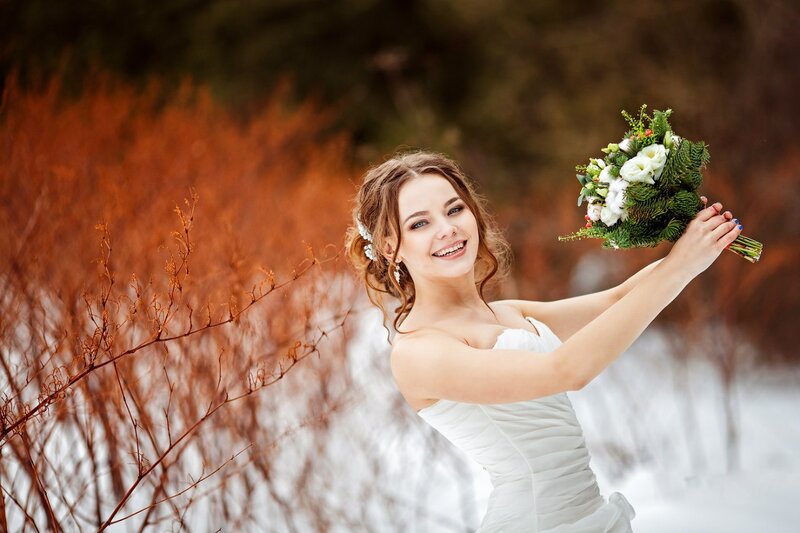Bride Holding Bouquet — White, Serene, Winter