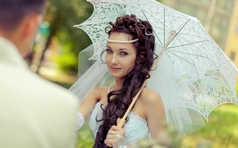 Bride Holding Lace Umbrella