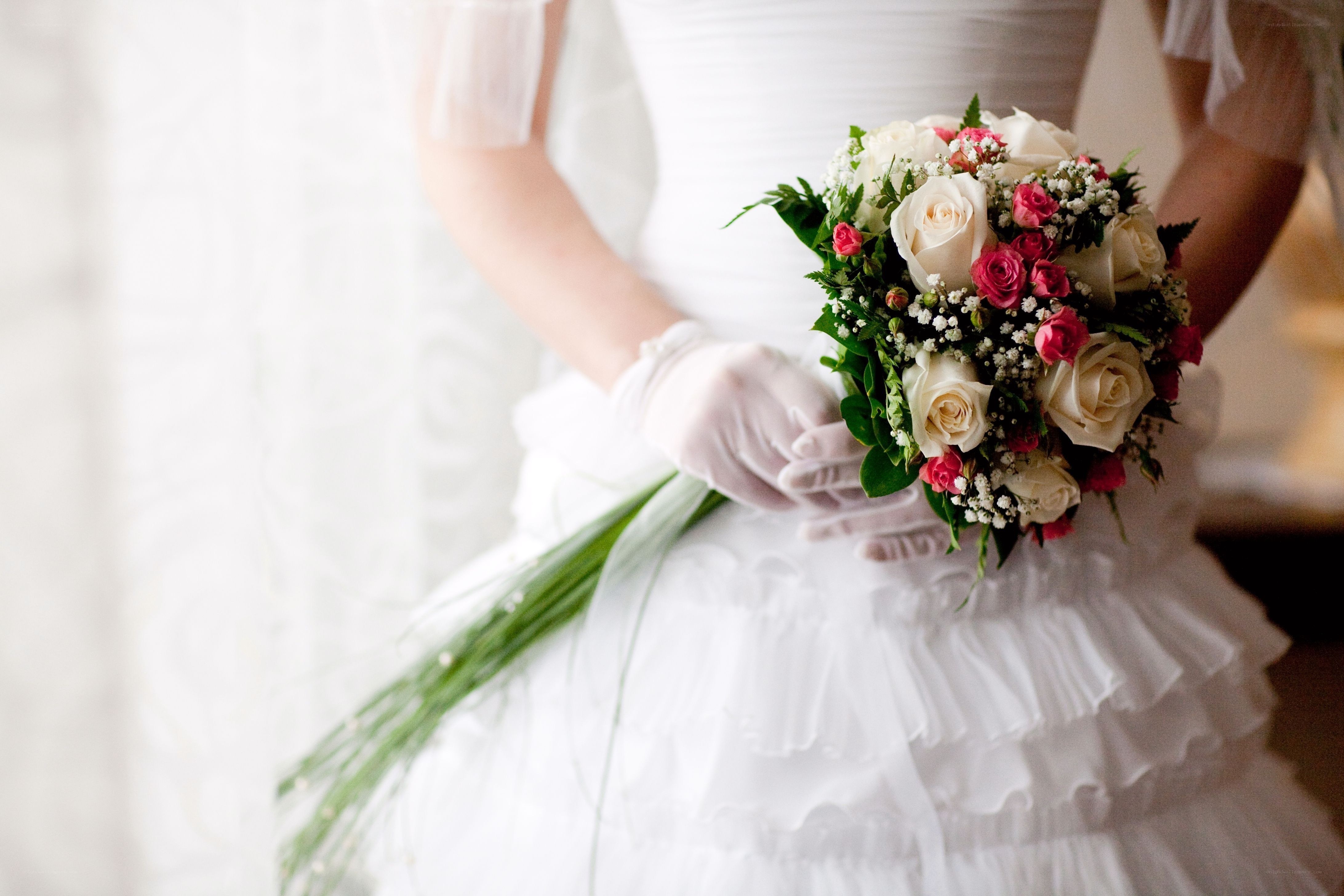 Bride holding wedding bouquet