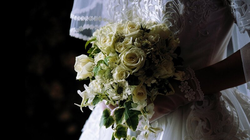 Bride holding wedding bouquet