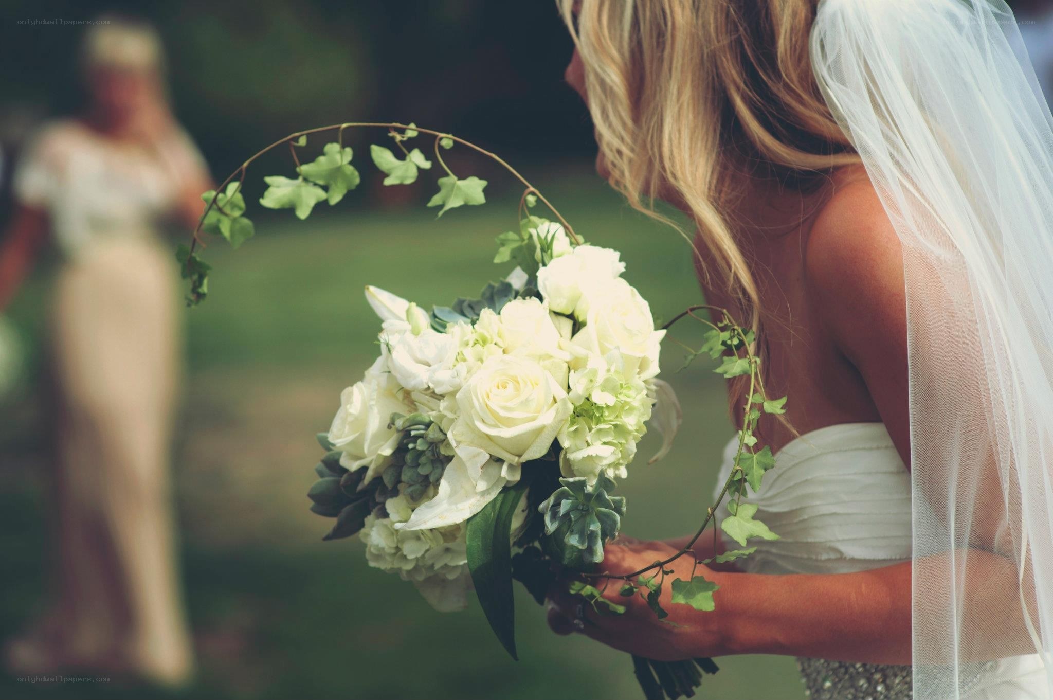 Bride holding wedding bouquet