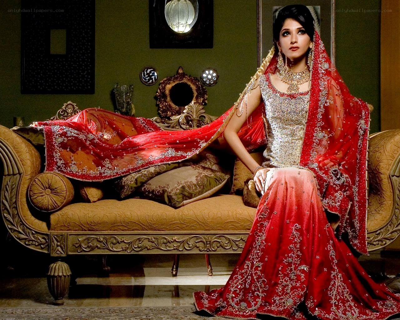 Bride in red and gold attire