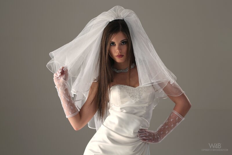 Bride in veil and gloves