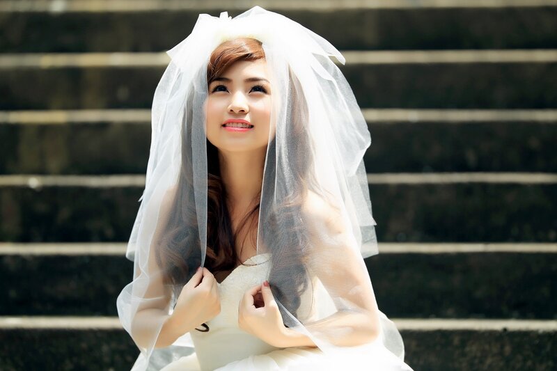 Bride in veil on steps