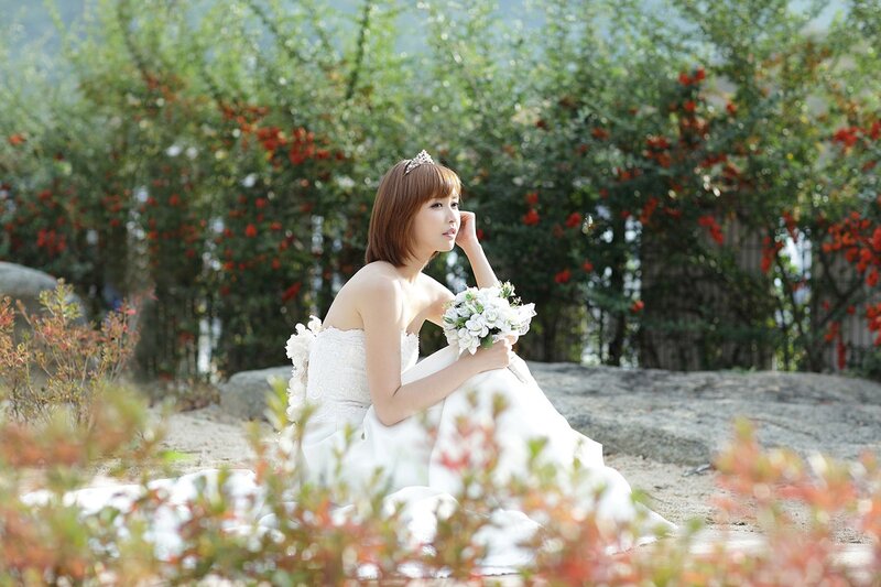 Bride in white dress outdoors