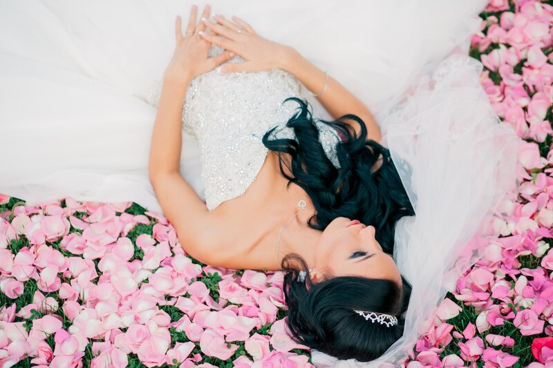 Bride Lying in Rose Petals — Pink
