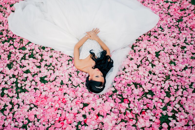 Bride Lying in Rose Petals