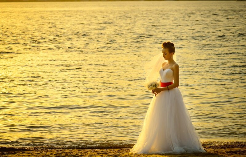 Bride on Beach — White, Serene, Sunset