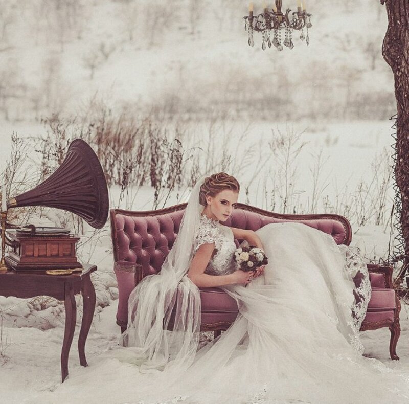 Bride on Couch in Snow