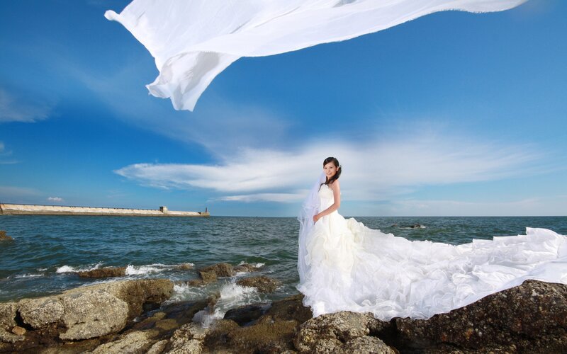 Bride on Rocky Shore