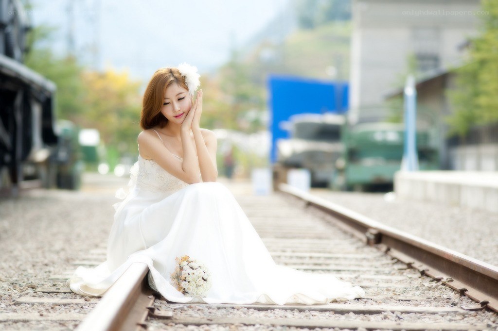 Bride on train tracks