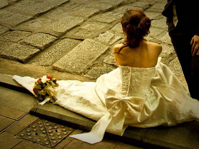 Bride Sitting on Steps — White