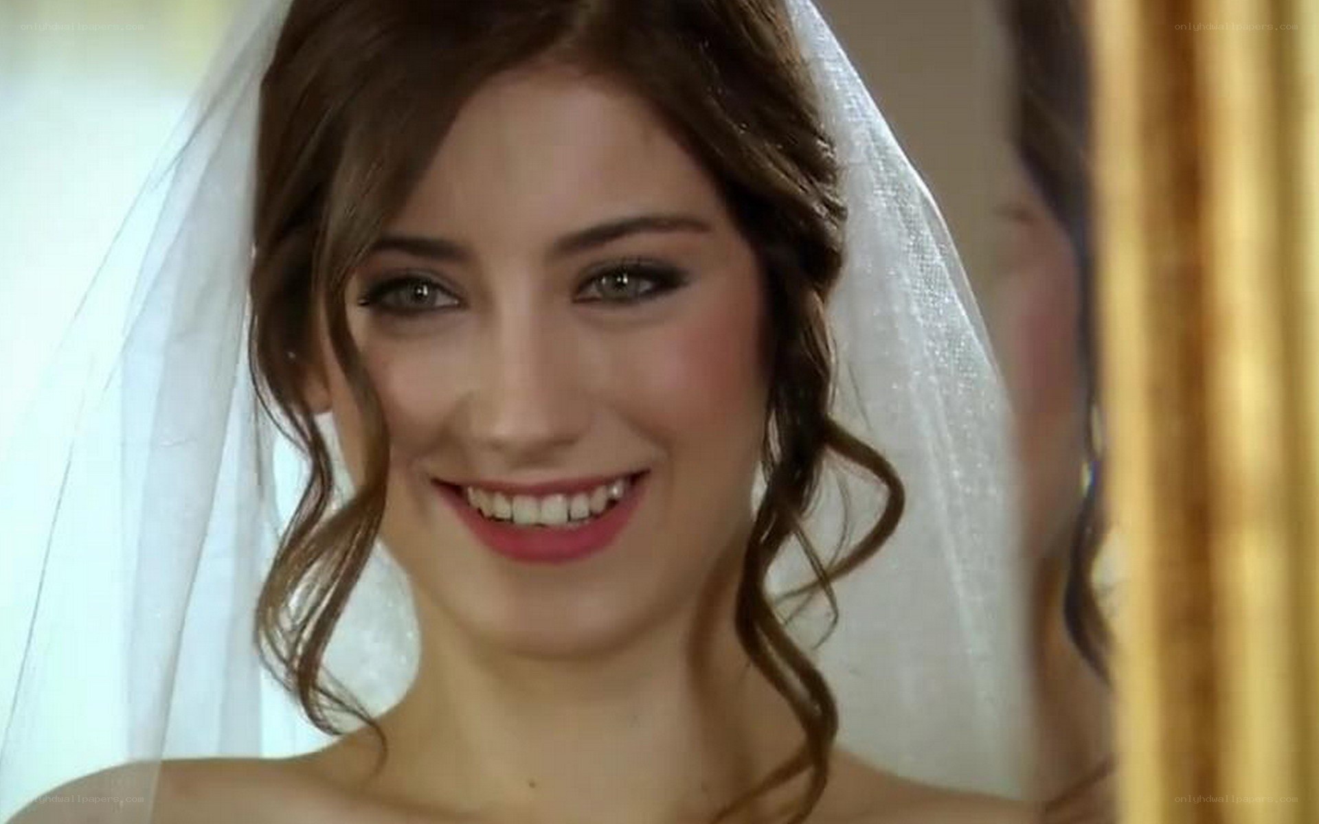 bride smiling in veil