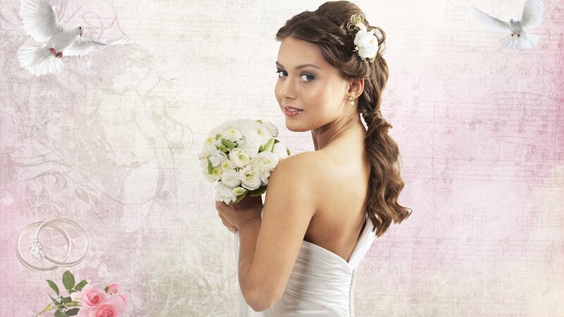 Bride with bouquet and doves